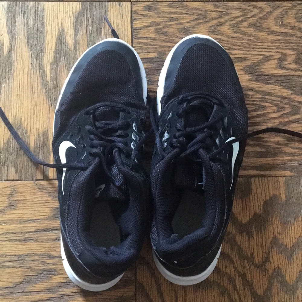 Nike running shoes, worn but in good condition.